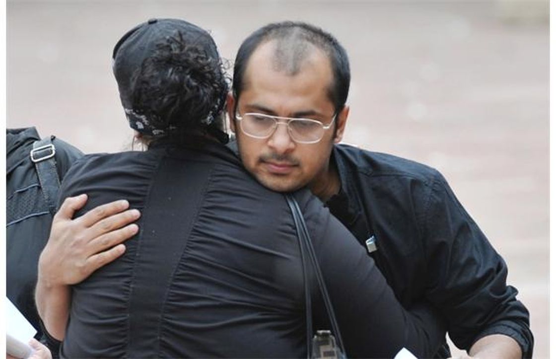 Anti-bullying rally at City Hall organized by Manwar Khan (right) who witnessed the deadly beating of John Hollar on the LRT in December of 2012.