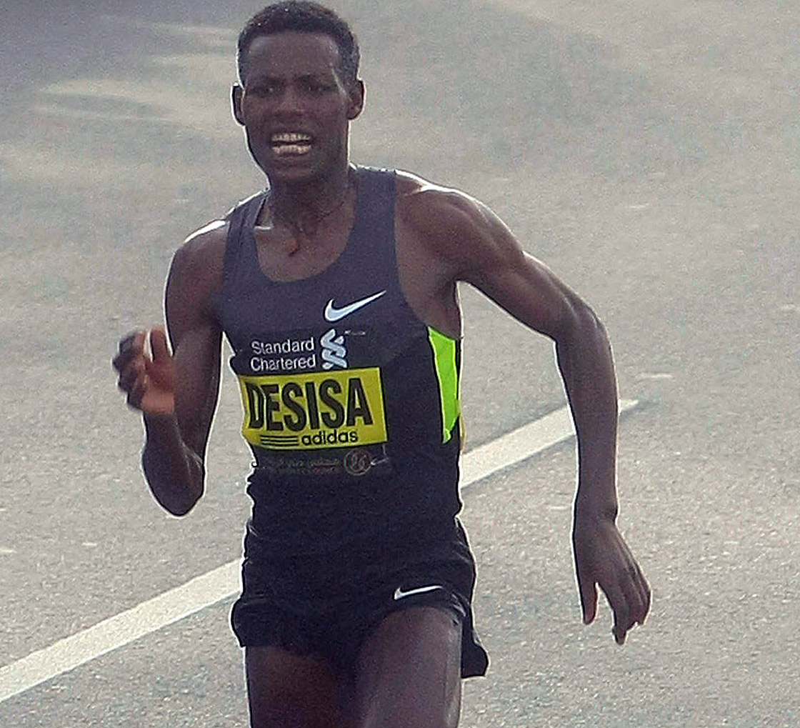 Lelisa Desisa Benti of Ethiopia approaches the finish line to win the Standard Chartered Dubai Marathon in Dubai, United Arab Emirates, Friday Jan. 25, 2013. Desisa won the 117th edition of the Boston Marathon.