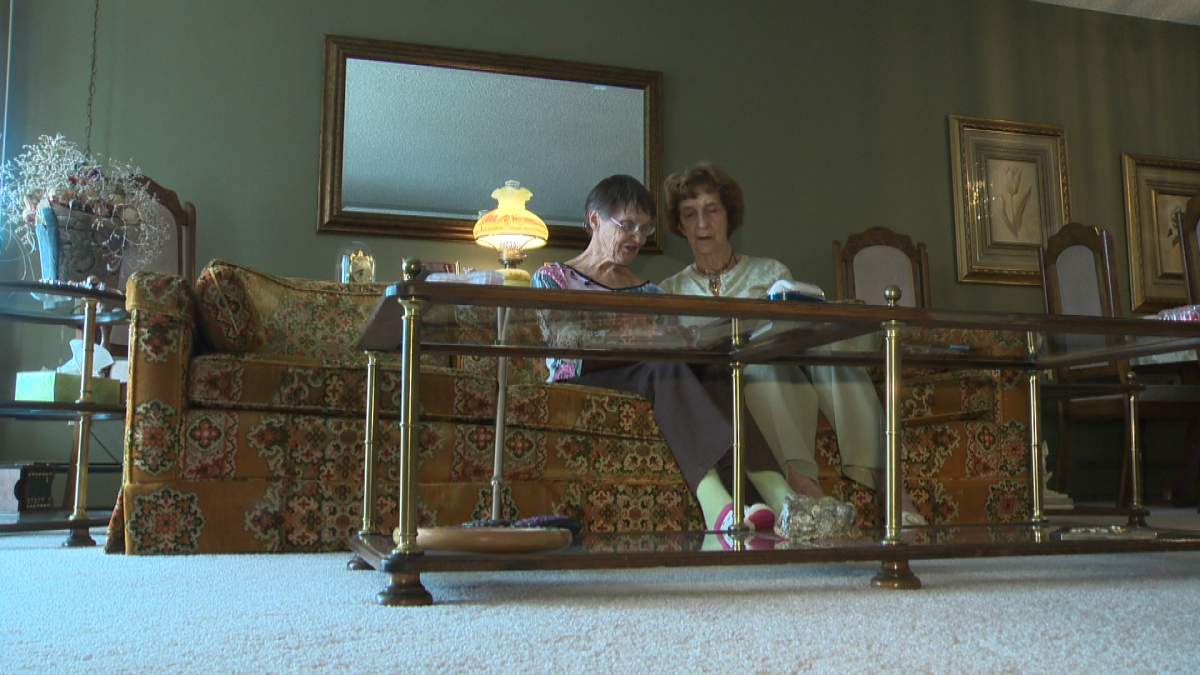 Tedda Kaminski (pictured with her caregiver, Carol) lived at Red Deer's Michener Centre for nearly 20 years before leaving in 1974.