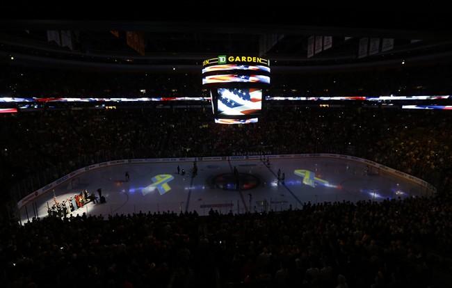 Bruins Hang 'Boston Strong' No. 617 Jersey With American Flag in