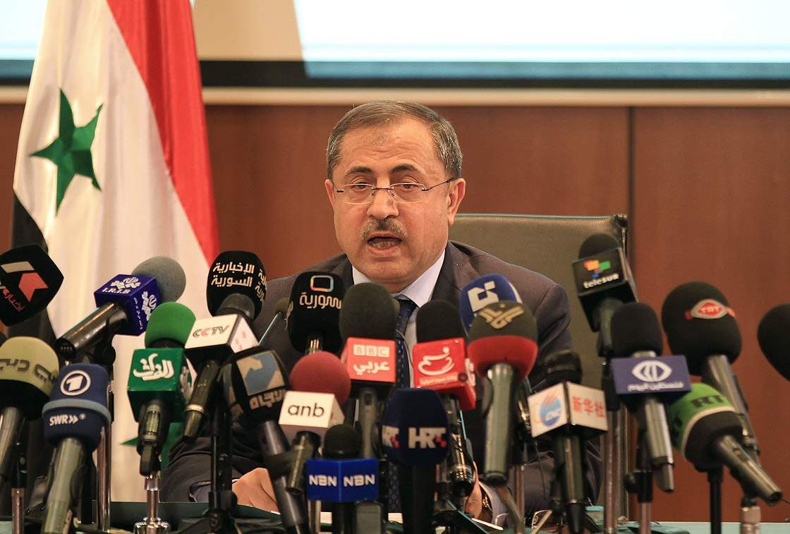 Syrian Interior Minister Mohammed al-Shaar holds a press conference to announce the results of the referendum on a new constitution in Damascus on February 27, 2012.