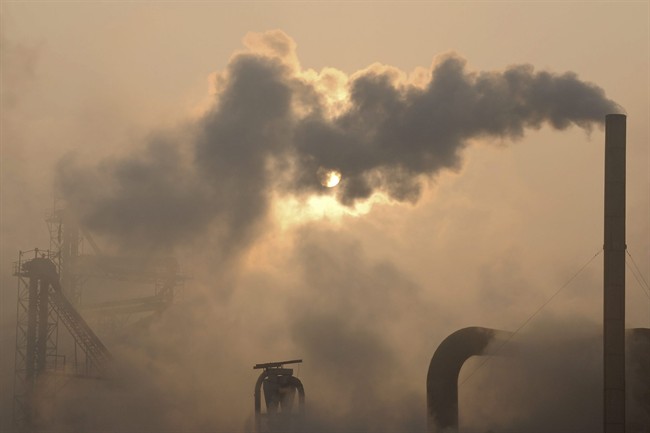 Six men have been charged over a massive pollution credit fraud scheme in Britain.
