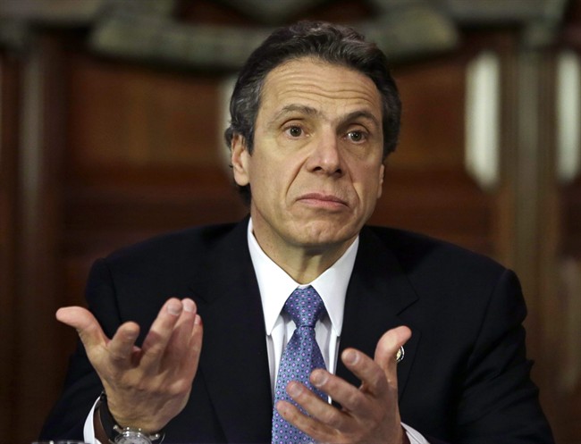In this file photo on Jan. 2, 2013, New York Gov. Andrew Cuomo gestures during a news conference in the at the Capitol in Albany, N.Y.