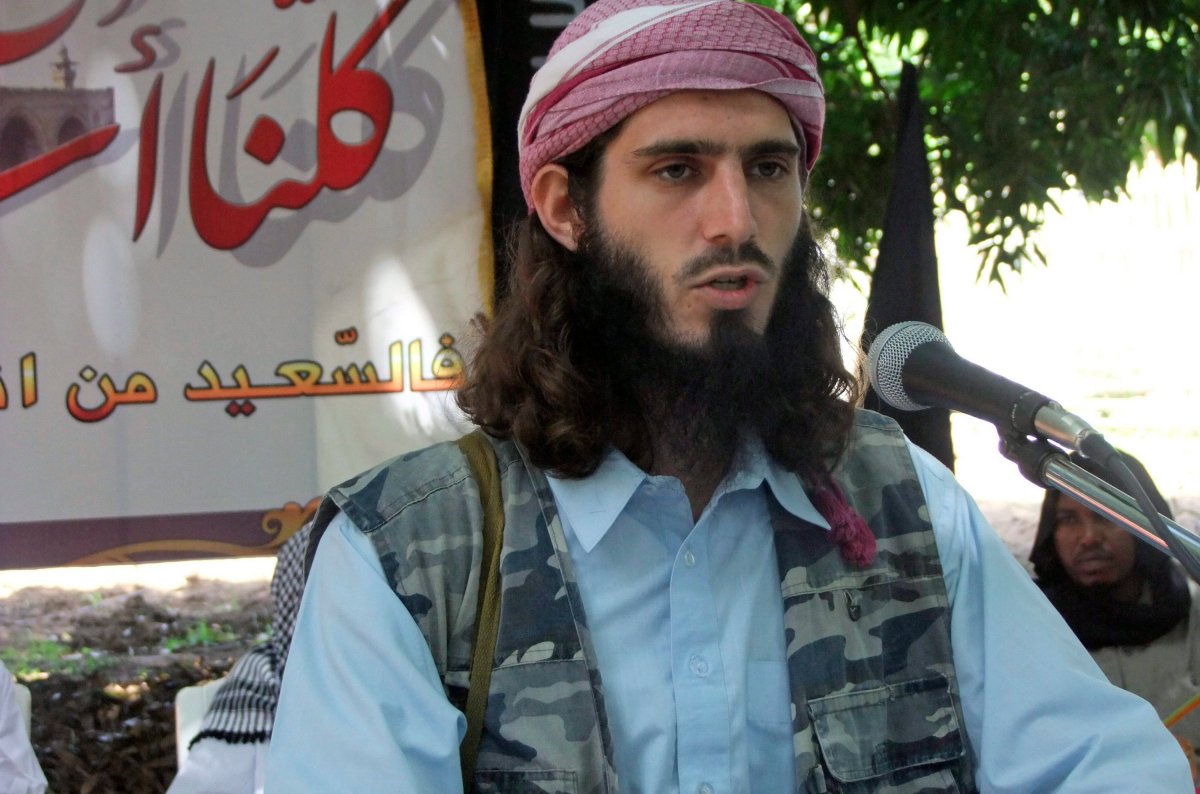 In this Wednesday, May 11, 2011 file photo, American-born Islamist militant Omar Hammami, 27, also known as Abu Mansur al-Amriki, addresses a press conference of the militant group al-Shabab at a farm in southern Mogadishu's Afgoye district in Somalia. 