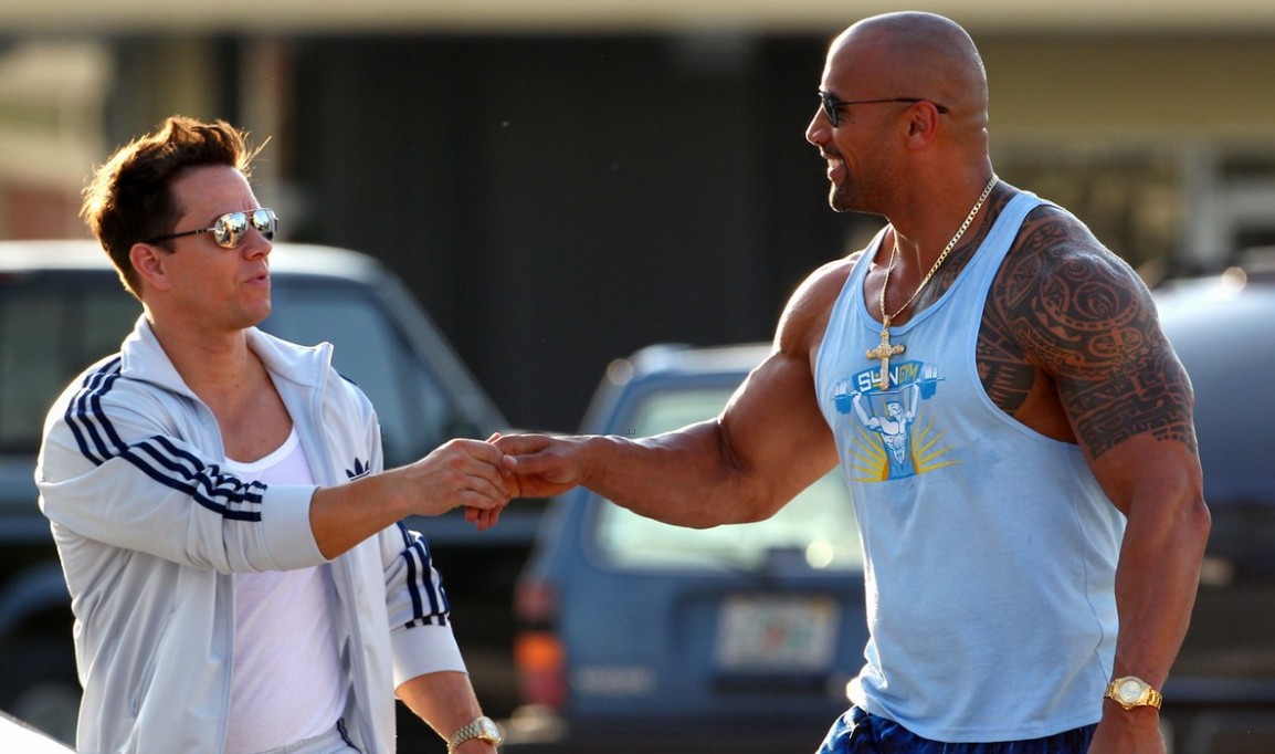 Mark Wahlberg and Dwayne Johnson in a scene from 'Pain & Gain.'.