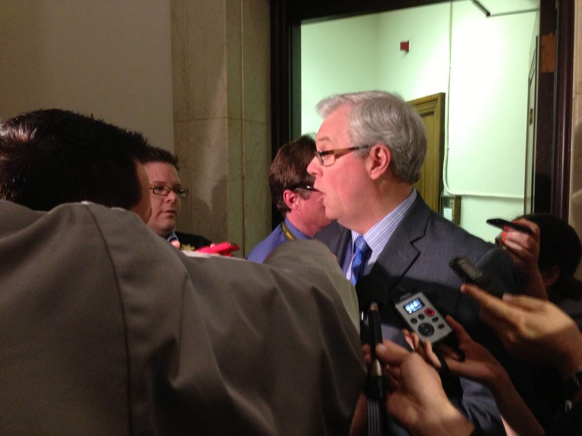 Manitoba Premier Greg Selinger speak to media at the Legislature on April 17, 2013