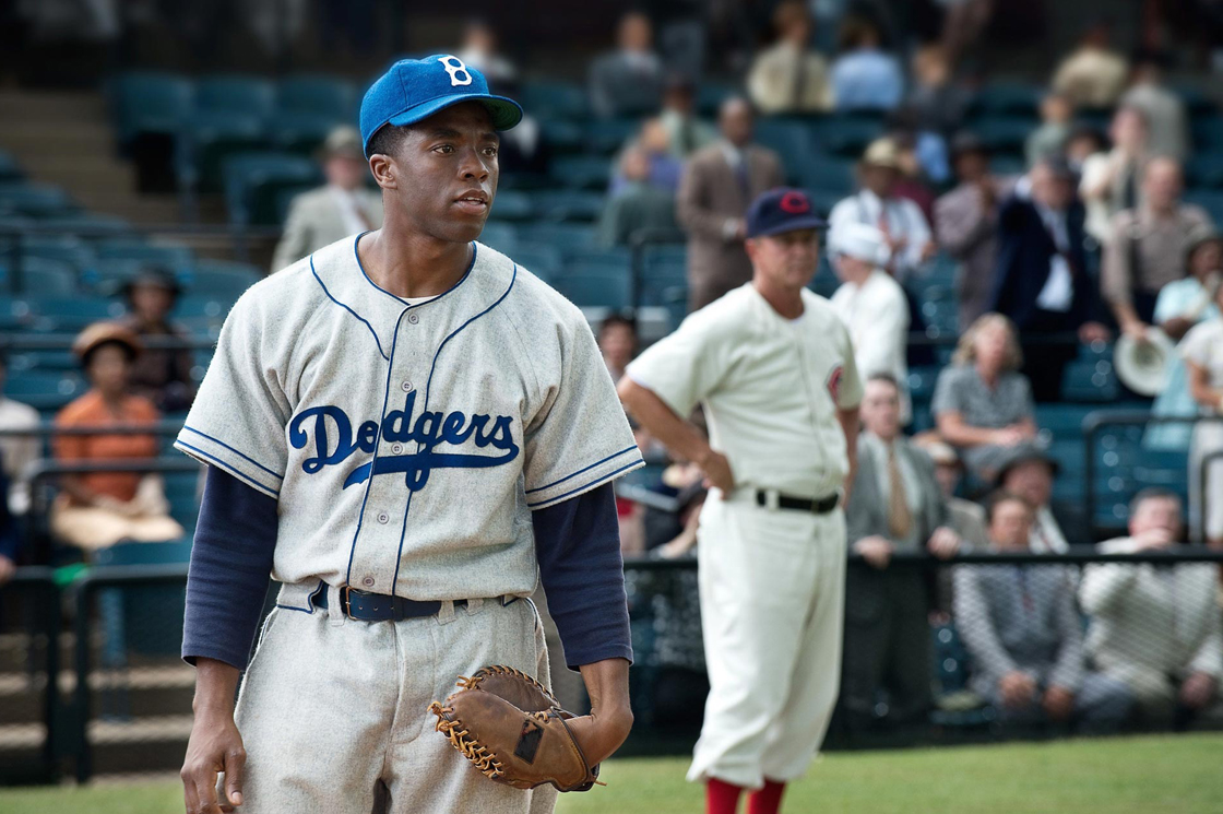 Chadwick Boseman stars as Jackie Robinson in '42.'.