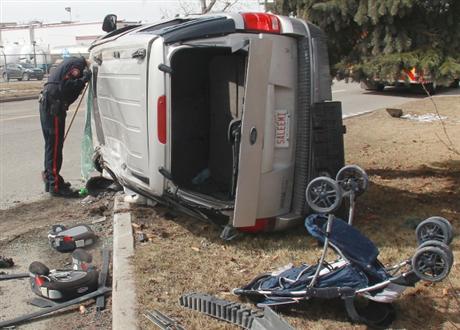 Student competing in auto skills challenge rescues two children from overturned minivan - image