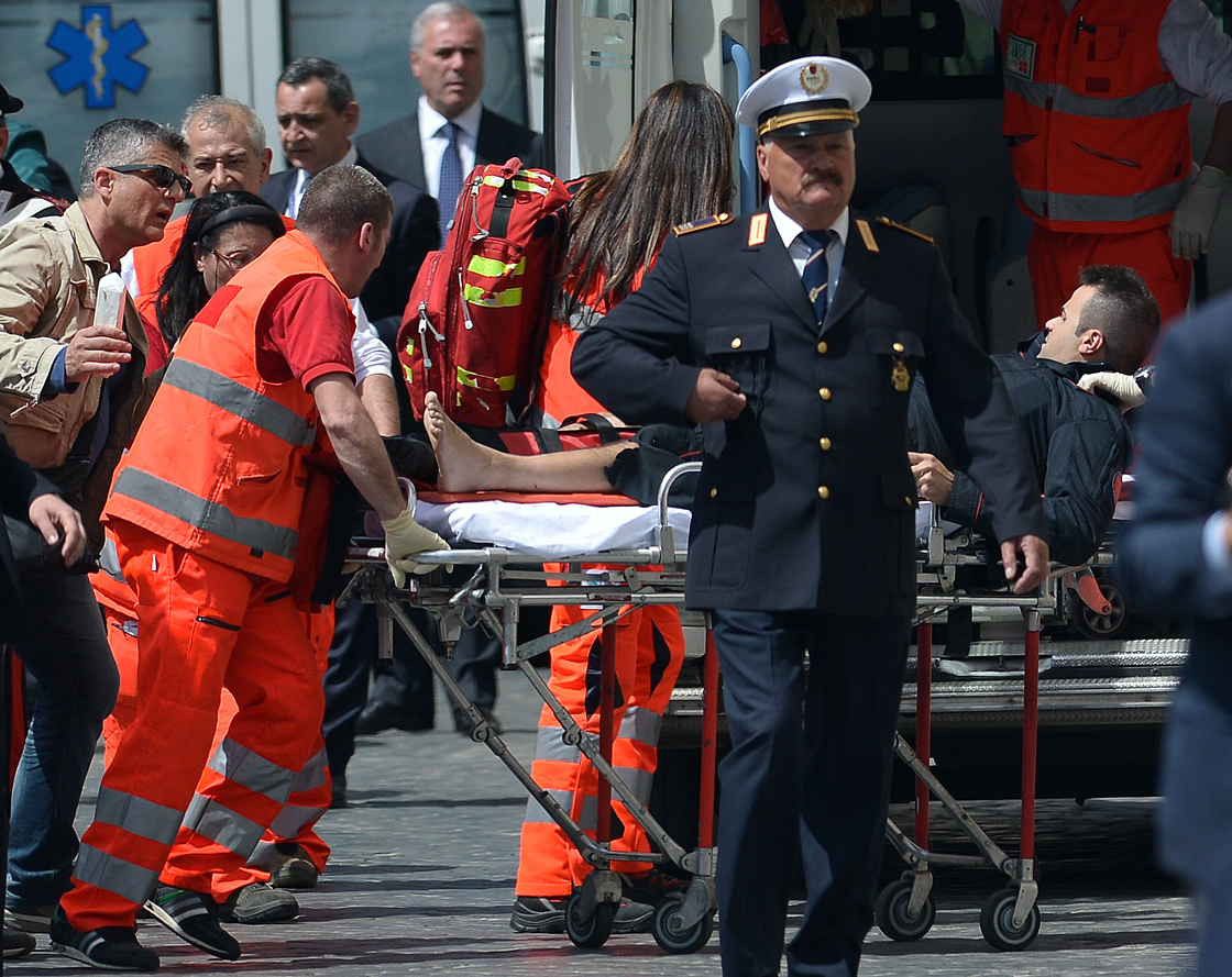 2 police officers shot outside Italian premier’s office in Rome ...
