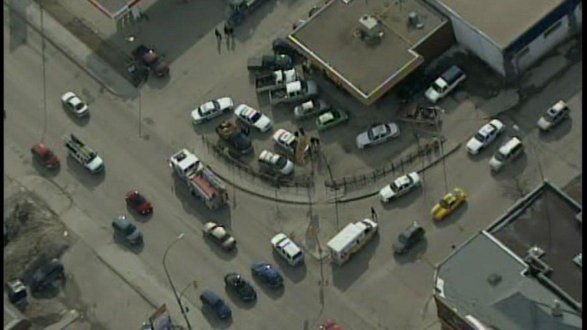 Police are seen at Selkirk Avenue and Salter Street from Skyview1 on Wednesday.