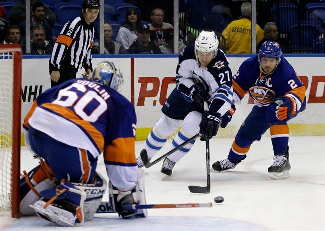 Islanders surge past Jets 5-2 - image