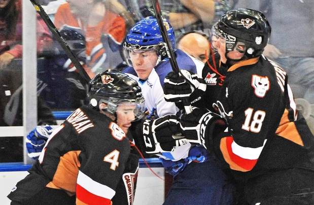 The Edmonton Oil Kings and Calgary Hitmen faceoff in the WHL's Eastern Conference final. 