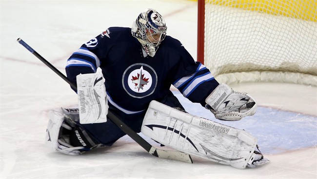 Winnipeg Jets goalie gets few breaks but likes it - image