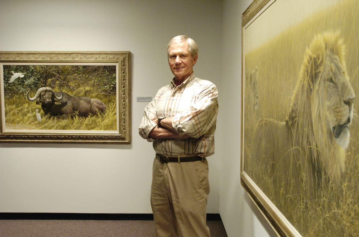 Canadian artist Robert Bateman stands in front of his work on Sept. 9, 2007. 