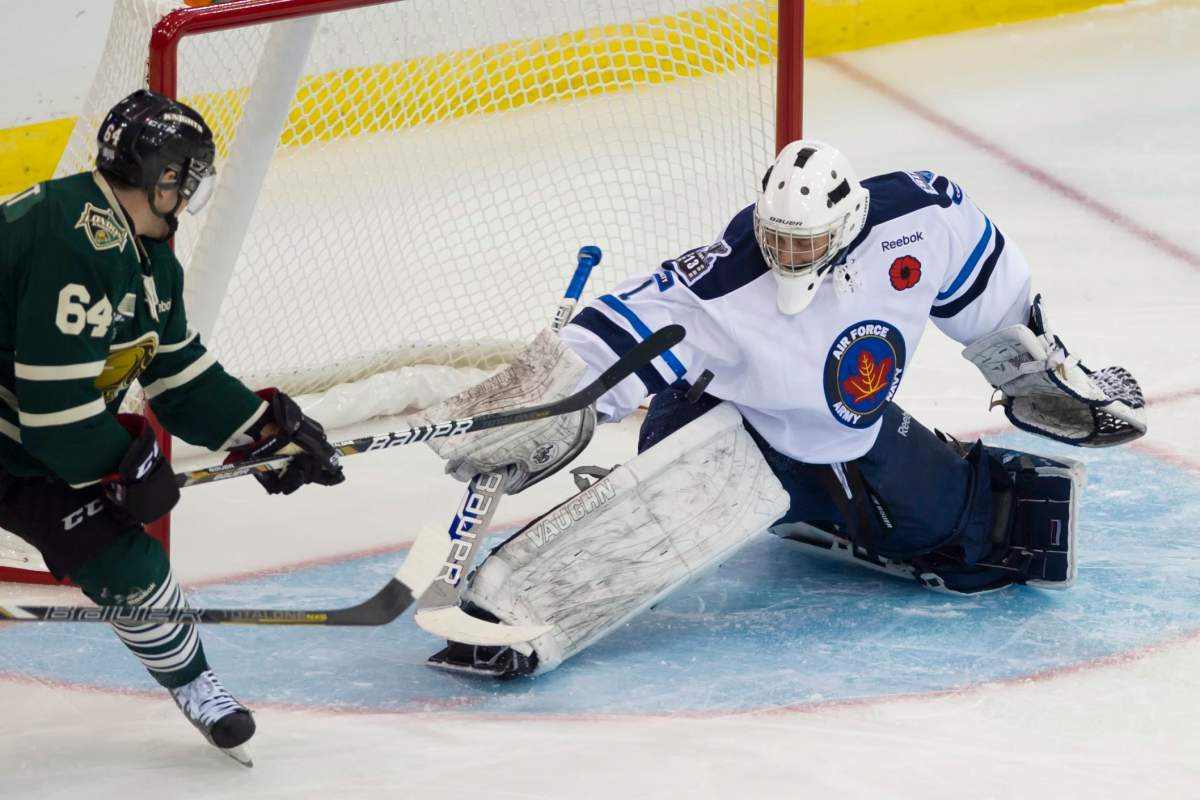 Saskatoon Blades goaltender Andrey Makarov stops a shot from London Knights centre Ryan Rupert during first period Memorial Cup action in Saskatoon, Sask., on Friday, May 17, 2013.