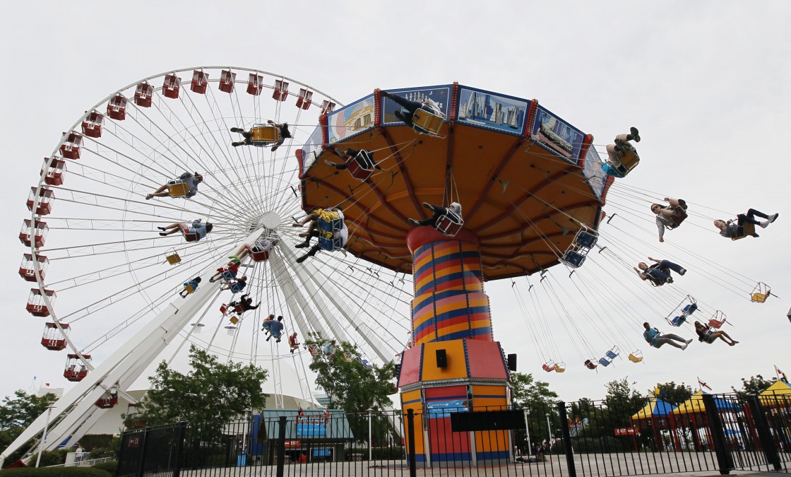 A manager of Chicago's Navy Pier rode the tourist spot's Ferris wheel for more than two days, bringing the world record for the longest ride to the birthplace of the amusement park favourite.