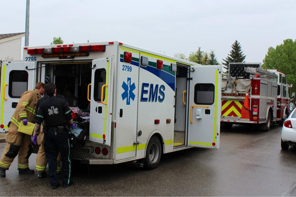 File photo of a Calgary EMS crew at work on May 30, 2013.