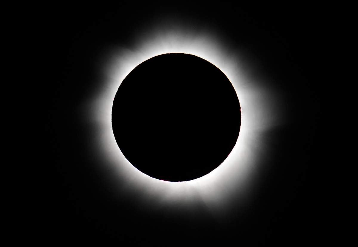 Totality is reached during the November 14, 2012 eclipse as seen from Palm Cove, Australia.