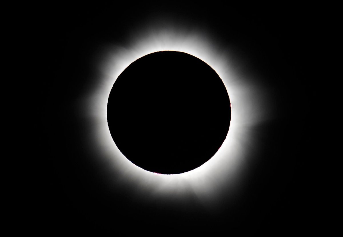 Totality is reached during the November 14, 2012 eclipse as seen from Palm Cove, Australia.