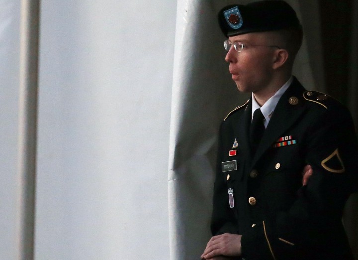 Pfc. Bradley E. Manning is escorted from a hearing, on January 8, 2013 in Fort Meade, Maryland. 