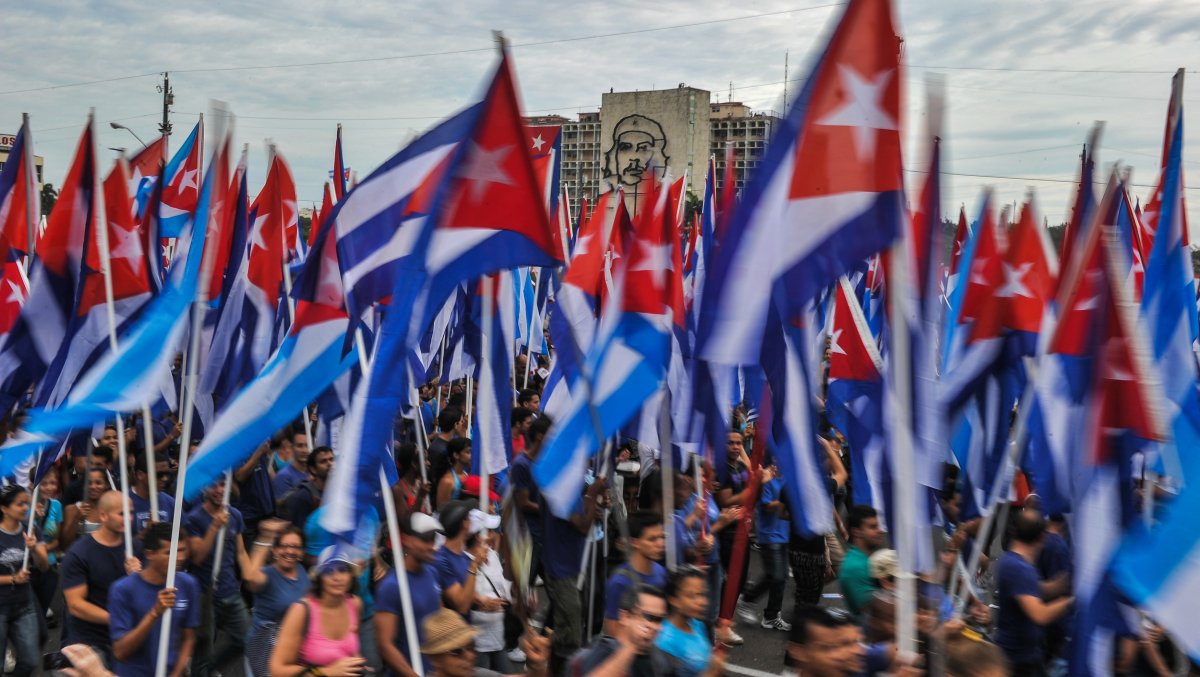 Millions of Cubans take part in May Day celebrations even as the US State Department has announced it will keep Cuba on a list of state sponsors of terrorism. (STR/AFP/Getty Images).