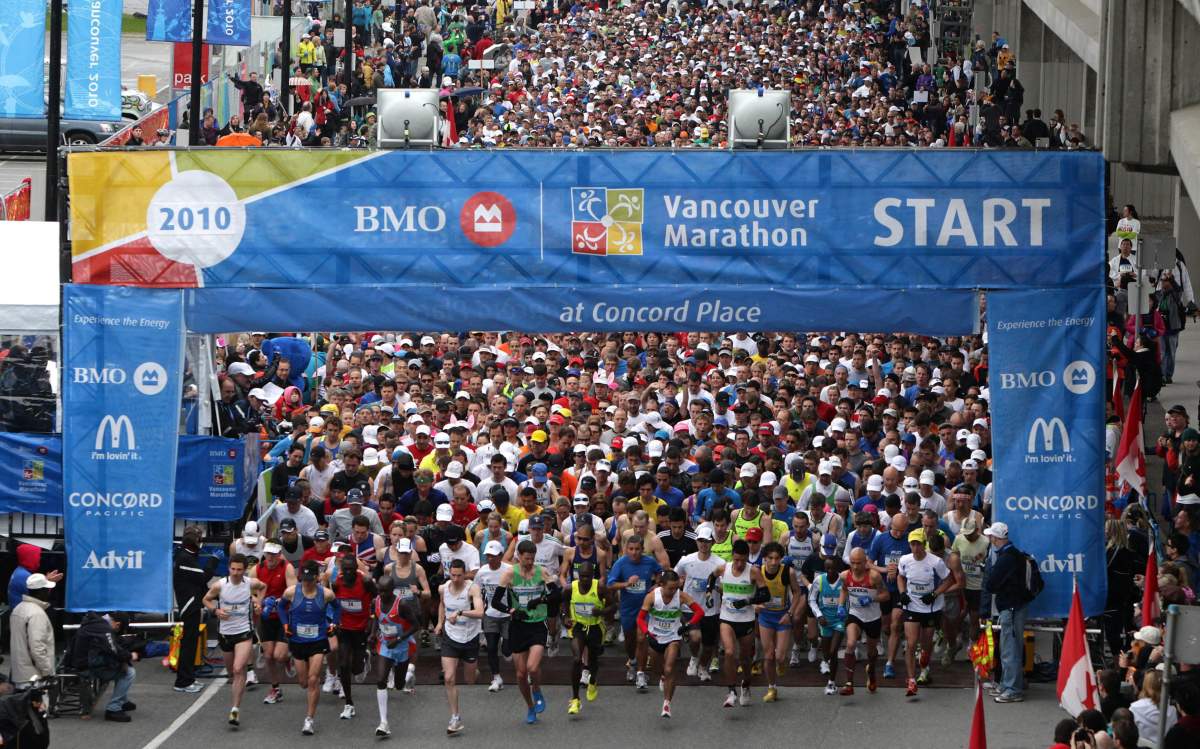 Runners race from the starting line during the BMO Vancouver Marathon in Vancouver, B.C., on Sunday May 2, 2010. 