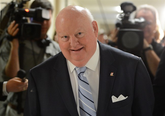 Senator Mike Duffy leaves a meeting of the Senate Internal Economy, Budgets and Administration committee on Parliament Hill Thurday May 9, 2013 in Ottawa. 
