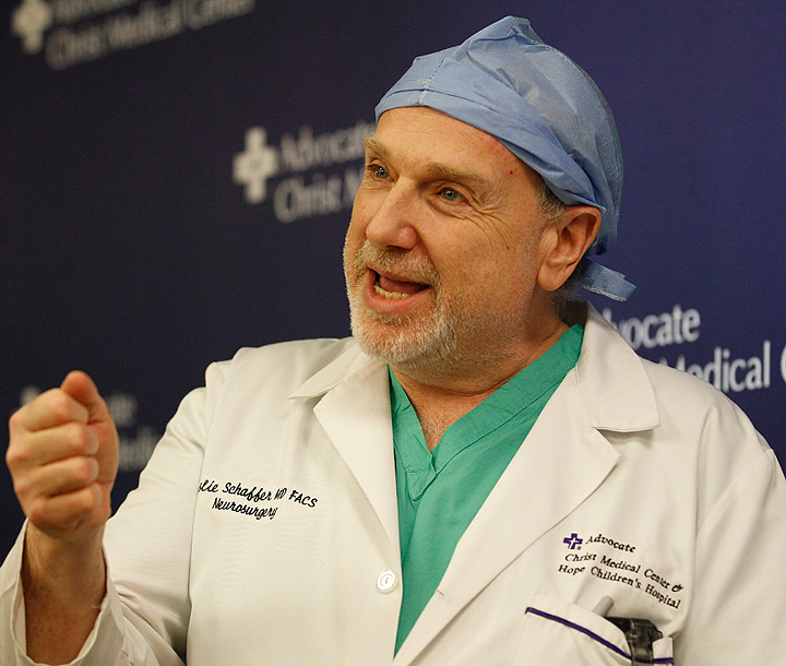 Neurosurgeon Leslie Schaffer, discusses his patient Dante Autullo, during a news conference at Advocate Christ Medical Center Friday, Jan. 20, 2012, in Oak Lawn, Ill. The surgeon spoke a day after Autullo underwent surgery to remove a 3 1/4 inch nail lodged in his brain after accidentally shooting himself with a nail gun.