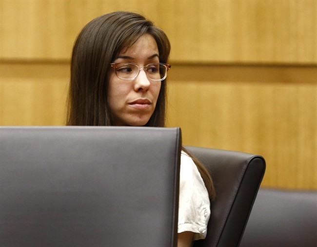 Jodi Arias looks at her family on Monday, May 20, 2013 during the penalty phase of her murder trial at Maricopa County Superior Court in Phoenix, Ariz. Arias was convicted of first-degree murder in the stabbing and shooting to death of Travis Alexander, 30, in his suburban Phoenix home in June 2008. 