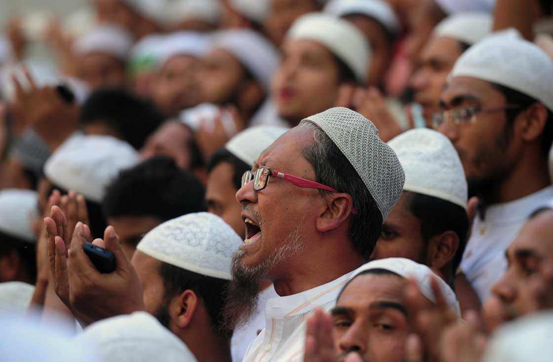 Bangladeshi Hifazat-e Islam activists shout slogans during a rally in Dhaka on April 5, 2013.  Both secular and Islamist protesters have taken to the streets over the war crimes trials of leaders of the Islamic Jamaat-e-Islami party in cases related to the 1971 liberation war against Pakistan. 