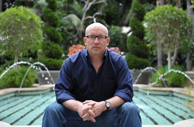 Alex Gibney poses for a portrait at the Four Seasons in Los Angeles. Gibney is the director of the documentary film, "We Steal Secrets: The Story of WikiLeaks," releasing in the US on May 24, 2013.