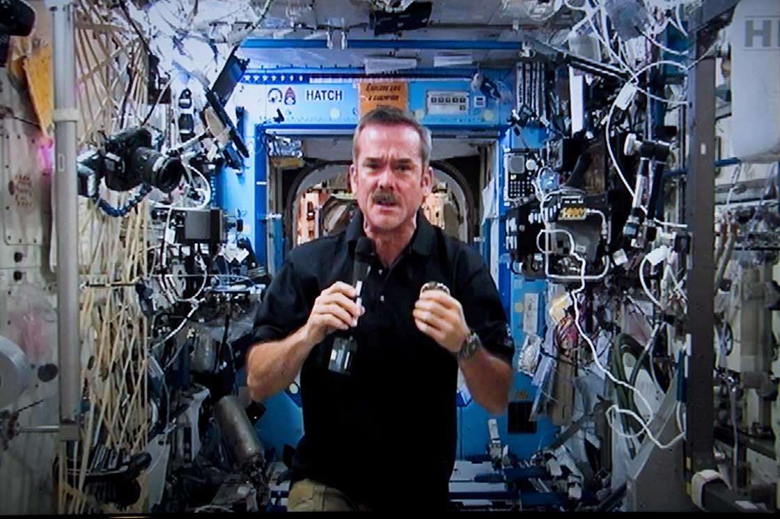 Canadian astronaut Chris Hadfield responds to a question during a news conference from the International Space Station on Thursday, January 10, 2013. 