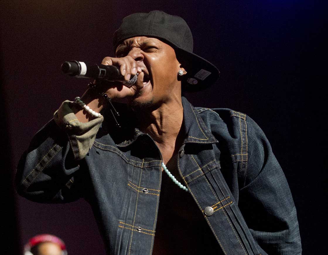 In this Feb. 23, 2013 photo, Chris Kelly of Kris Kross performs on stage at the Fox Theatre in Atlanta during the So So Def 20th Anniversary Concert.
