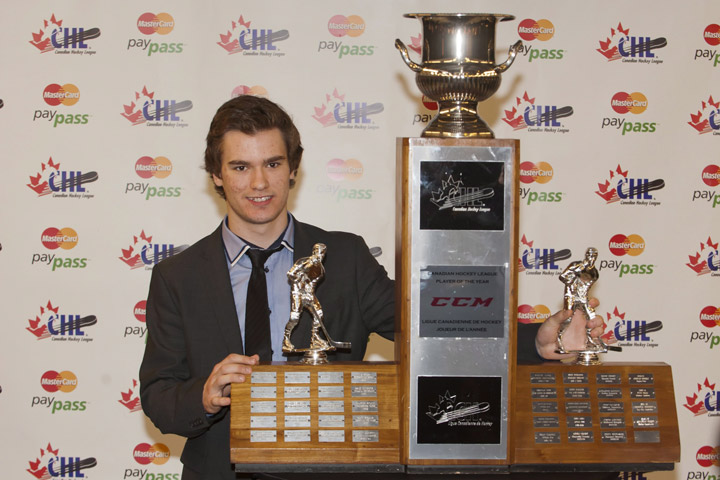 Jonathan Drouin of the Halifax Mooseheads receives the Player of the Year Trophy during the 2012-13 CHL Awards Ceremony in Saskatoon, Sask. on Saturday, May 25, 2013. THE CANADIAN PRESS/Liam Richards.
