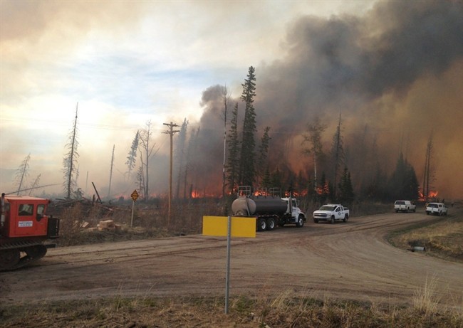 Crews battle a fire near Nordegg, Alberta on May 12.