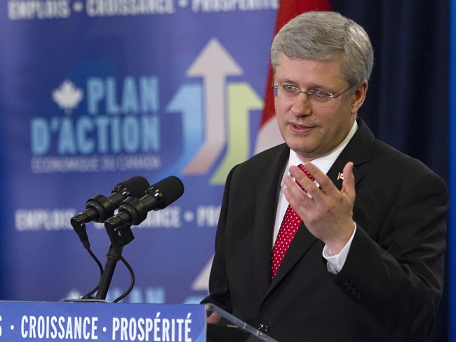 Prime Minister Stephen Harper speaks during an announcement on Friday, May 3, 2013 in Quebec City. Ottawa is planning 3 more years of 'economic action plan' ads.