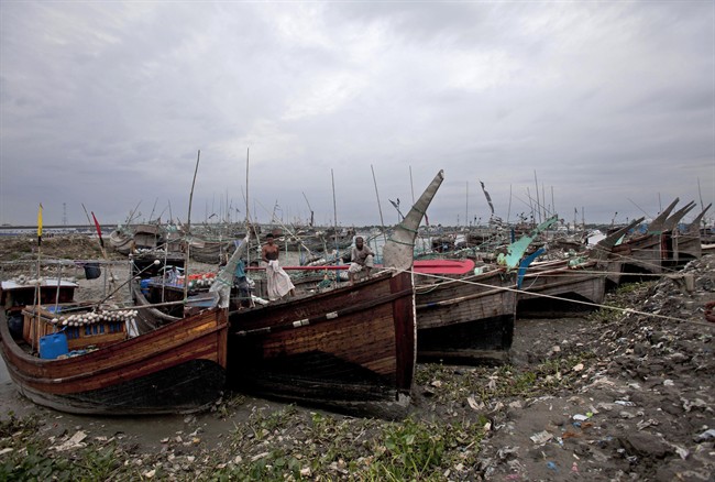 As rain from cyclone falls, Myanmar minority stay - image