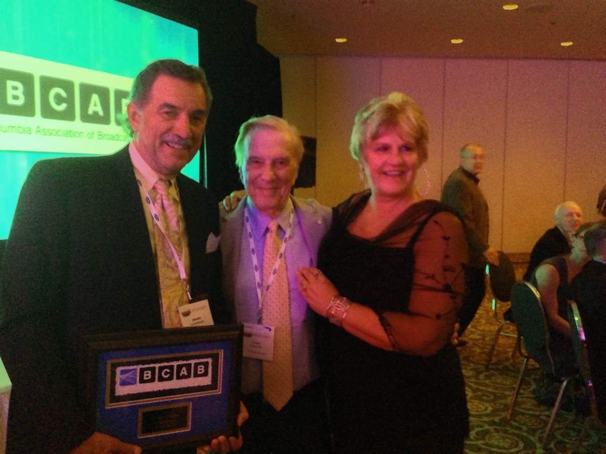 Dennis Gabelhouse receives Broadcaster of the Year Award in Penticton Thursday alongside his wife Gwen Gabelhouse and Lloyd Robertson. 
