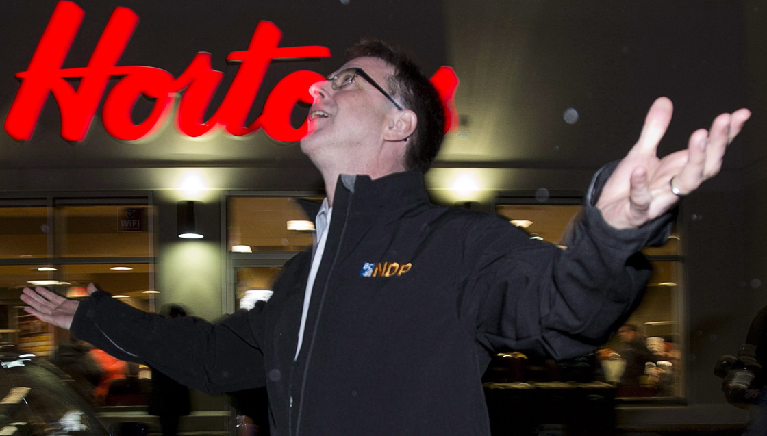 BC NDP leader Adrian Dix looks towards the sky after making a campaign stop in Hope, B.C. Monday, May 13, 2013. British Columbians will go to the polls May 14th.