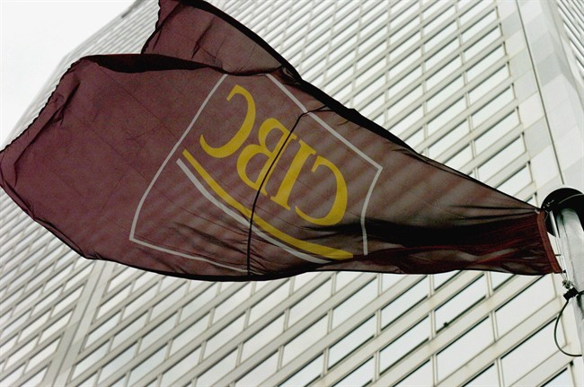 A flag flies outside the CIBC tower in Toronto on Dec. 1, 2005. 
