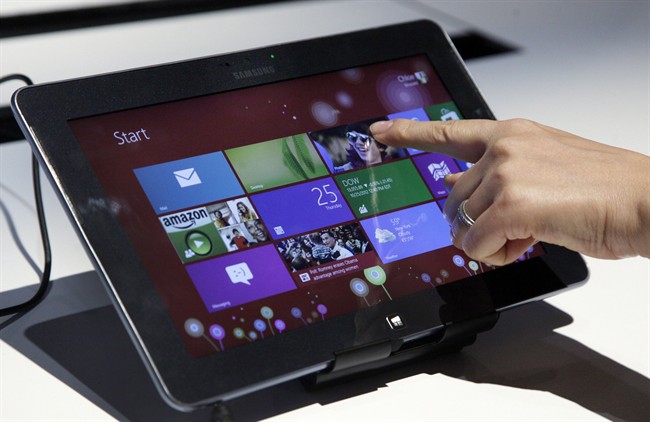 A user tries a Samsung tablet computer running Windows 8.