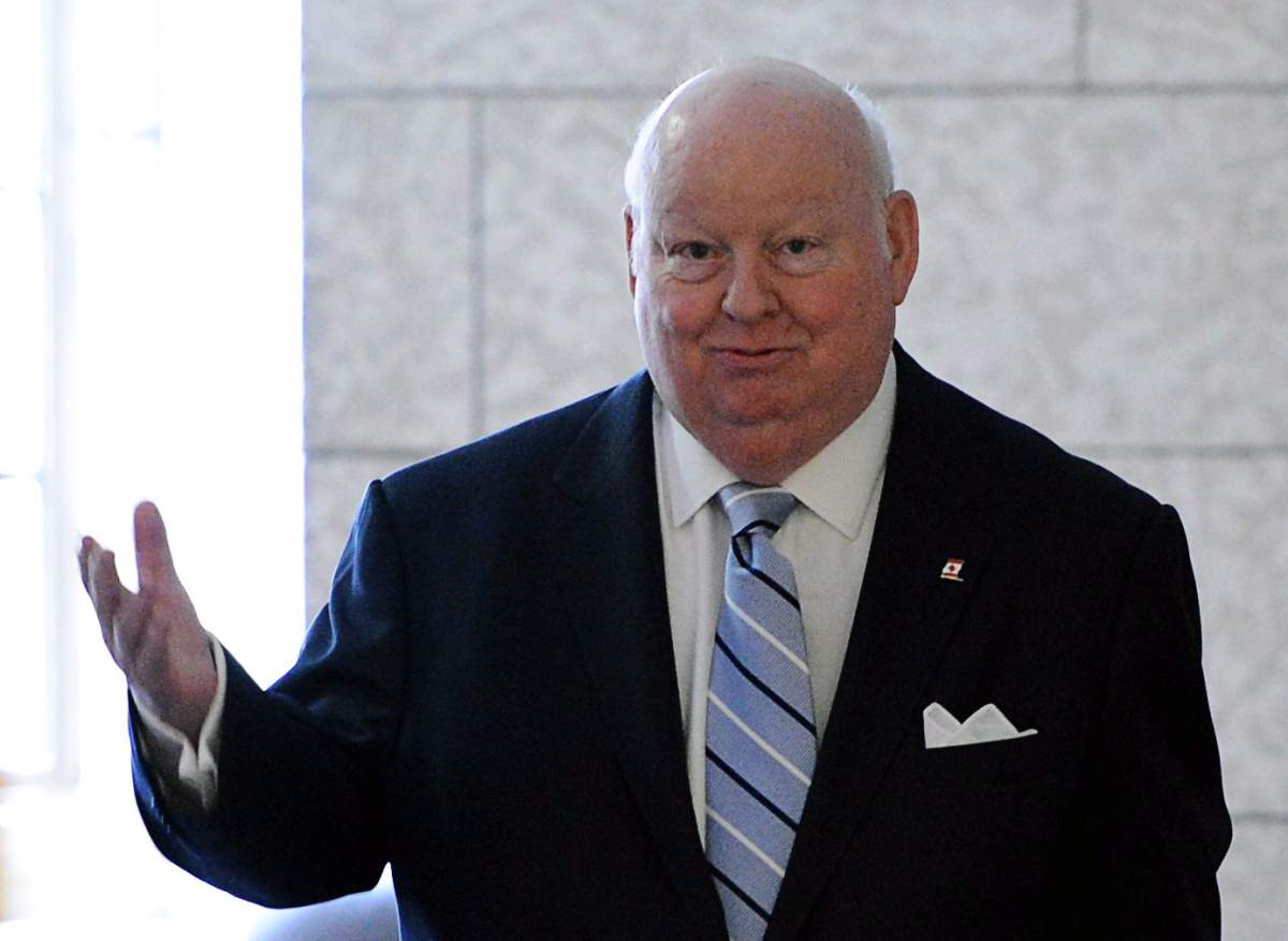 Senator Mike Duffy leaves Parliament Hill on May 9, 2013.