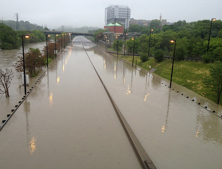 Severe flooding shut down a section of a major Toronto highway early Wednesday just before the start of the morning rush hour on Wednesday May 29, 2013.