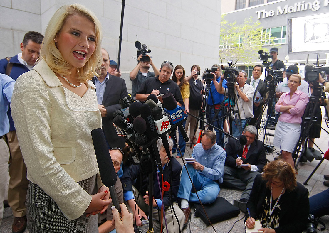 Elizabeth Smart (L) talks to the press outside of federal court after the sentencing of Elizabeths kidnapper Brian David Mitchell May 25, 2011 in Salt Lake City, Utah.