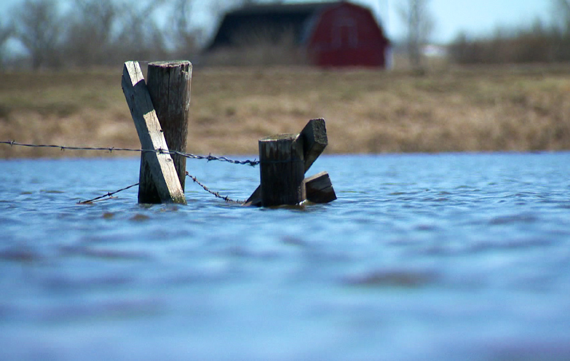 Persistent floodwaters leave roads in the Wakaw area submerged and force a family from their home.