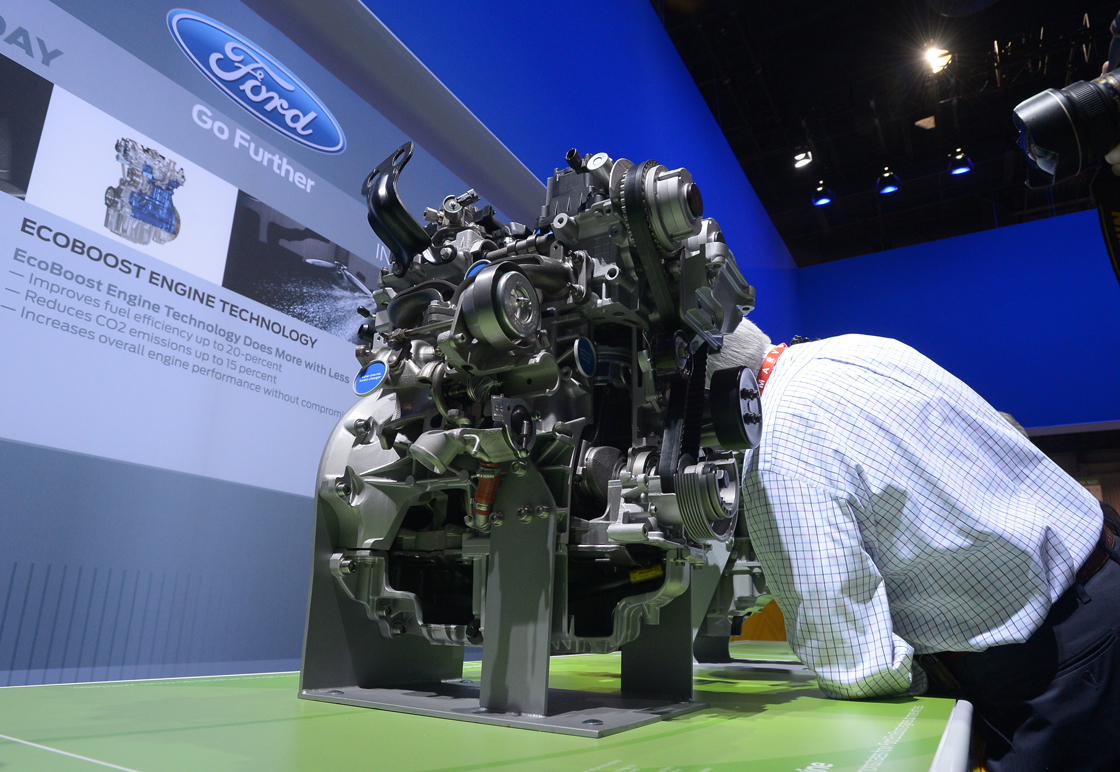 A visitor takes a close look at Ford's 1,6 EcoBoost engine at the 2013 International CES at the Las Vegas Convention Center on January 8, 2013 in Las Vegas, Nevada. 
