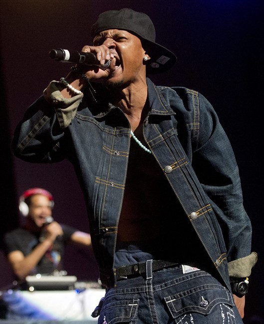 FILE - In this Feb. 23, 2013 file photo, Chris Kelly of Kris Kross performs on stage at the Fox Theatre in Atlanta during the So So Def 20th Anniversary Concert. 