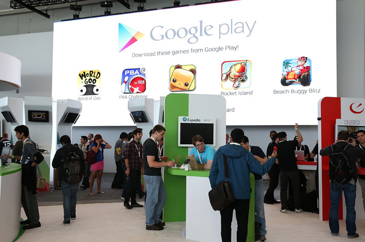 Attendees visit the Google Play booth during the Google I/O developers conference at the Moscone Center on May 15, 2013 in San Francisco, California. 