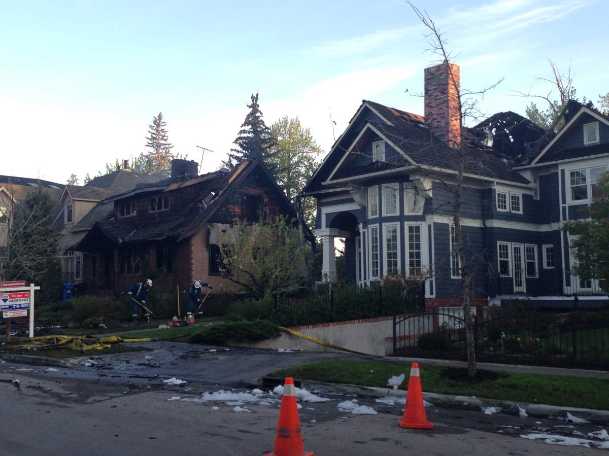 The cause is under investigation, but crews say it may have started in a fire pit behind one of the homes.