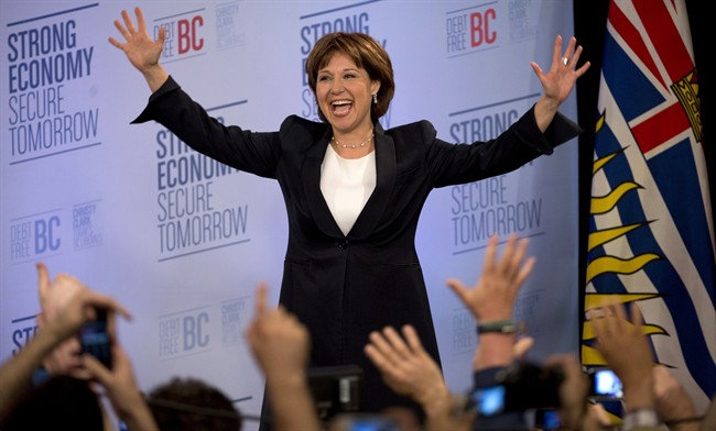 B.C. Liberal leader Christy Clark waves to the crowd after she arrives on stage after winning the British Columbia provincial election in Vancouver, B.C. Tuesday, May 14, 2013. 